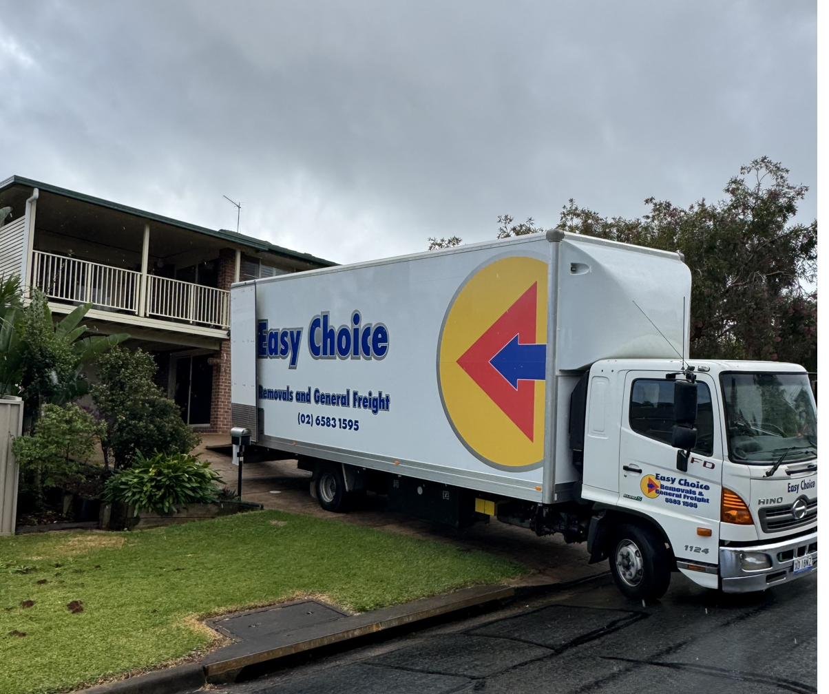 Easy Choice Removals truck parked outside a Port Macquarie home